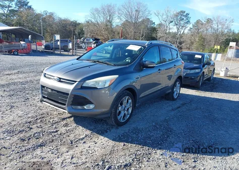 2014 Ford Escape Titanium z USA, uszkodzony, nr VIN 1FMCU0JX3EUB34011